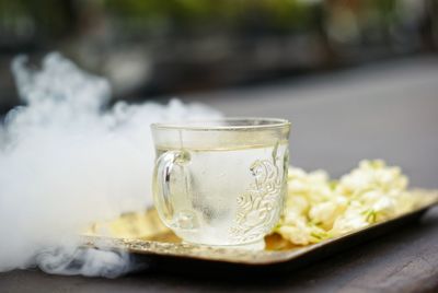 Close-up of tea in glass on table