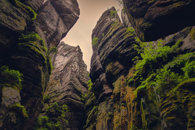 Low angle view of rocks against sky