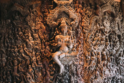 Sculpture of statues on building