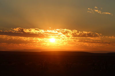 Scenic view of silhouette landscape against sky during sunset