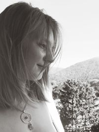 Close-up of young woman looking away