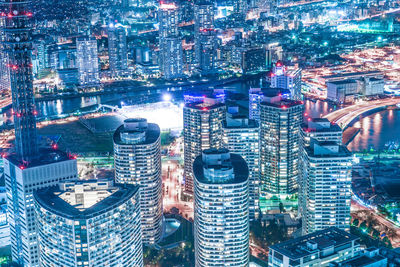 High angle view of illuminated cityscape at night