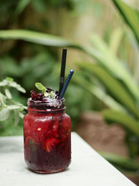 Close-up of drink in mason jar on table