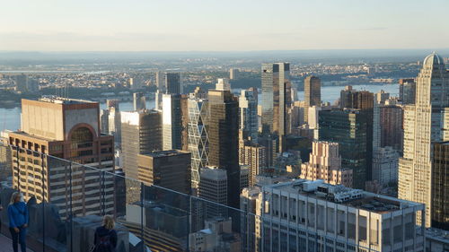 High angle view of buildings in city against sky