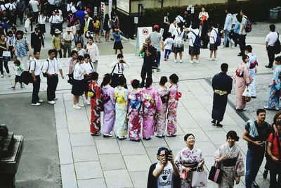 Group of people at market stall