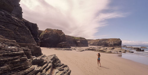 Full length of woman on beach