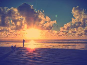 Scenic view of sea at sunset