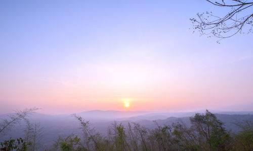 Scenic view of landscape against sky during sunset