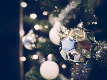 Close-up of illuminated christmas tree at night