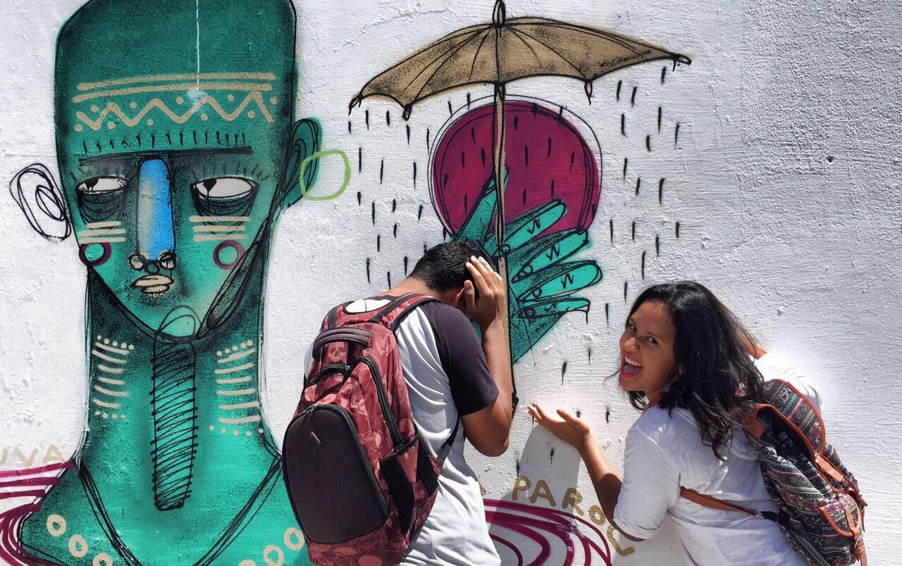 wall - building feature, young women, multi colored, mask - disguise, mural, long hair, young adult, person, outdoors, creativity