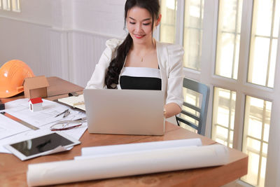 Woman working on table