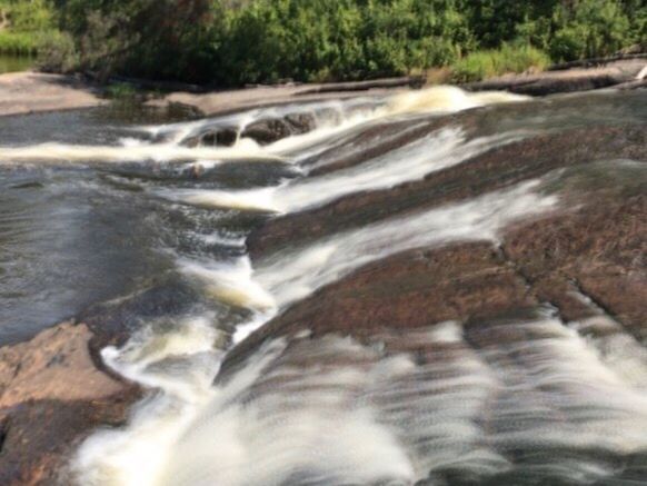 CLOSE-UP OF WATERFALL