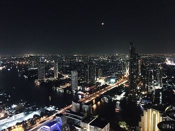 Illuminated cityscape at night