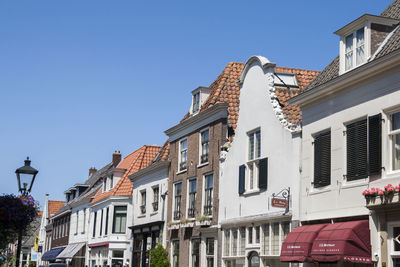 Low angle view of buildings against clear sky