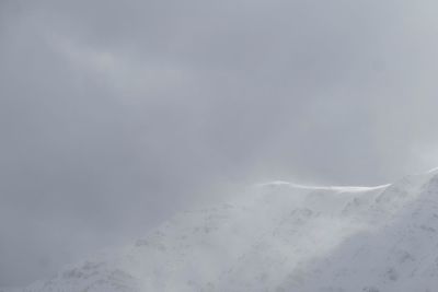 Scenic view of mountain against sky during winter