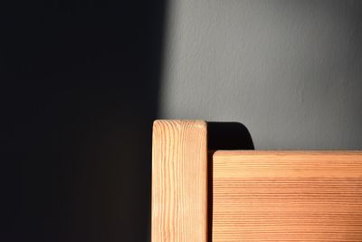 Close-up of wood against wall at home