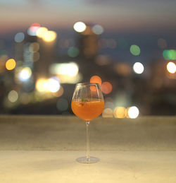 Close-up of wineglass on table