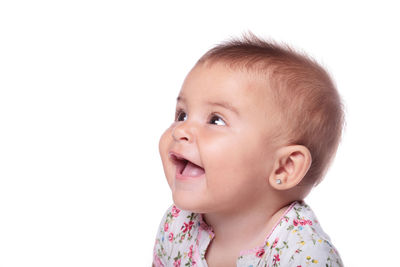 Portrait of a smiling girl over white background