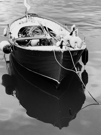 Close-up of fishing boat in sea