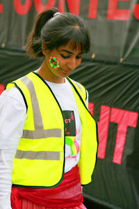 Portrait of smiling girl standing outdoors