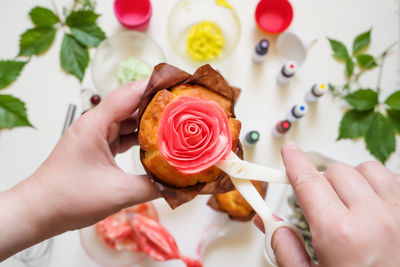Midsection of woman holding ice cream