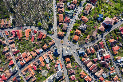 Aerial view of street amidst buildings in city