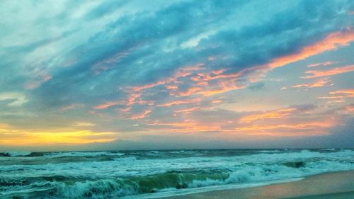 Scenic view of sea against sky during sunset