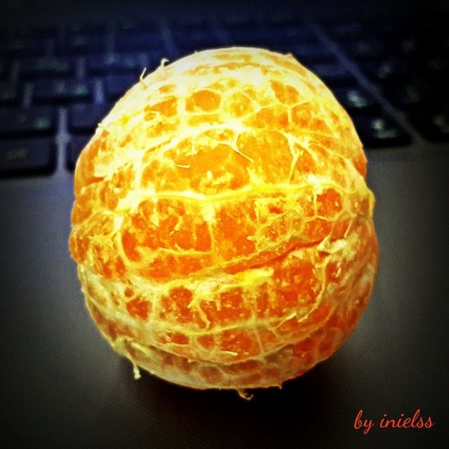 close-up, sphere, indoors, orange color, circle, illuminated, single object, still life, glowing, geometric shape, pattern, focus on foreground, studio shot, no people, night, shape, yellow, shiny, round, ball