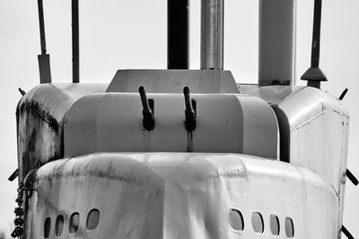 Close-up of white pipes against clear sky