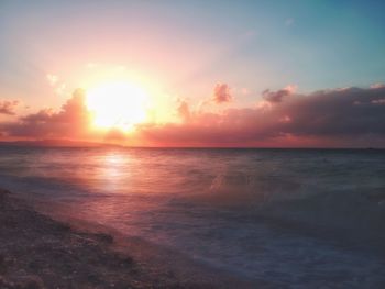 Scenic view of sea at sunset