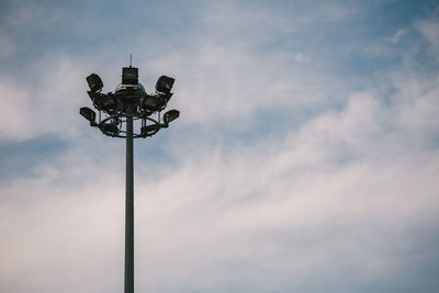 Low angle view of street light against sky