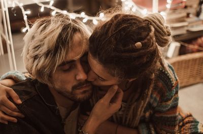 Rear view of couple kissing