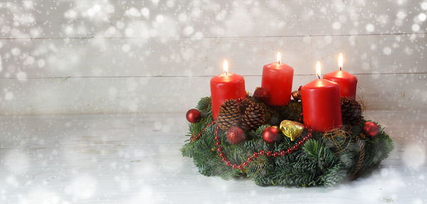 Close-up of illuminated christmas decoration on table