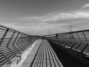 View of bridge against cloudy sky