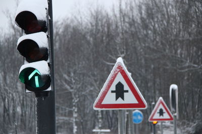 Road sign in winter 