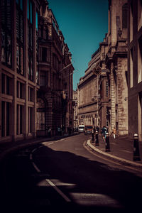 People walking on street in city