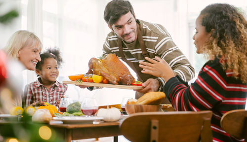 People by food on table