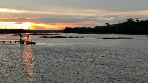 Scenic view of sea at sunset