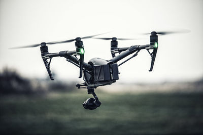 Close-up of drone against sky