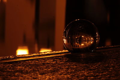 Close-up of illuminated lights on table