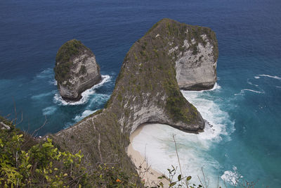 High angle view of rock formation in sea