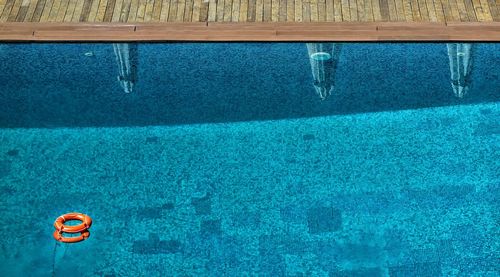 High angle view of inflatable ring on swimming pool