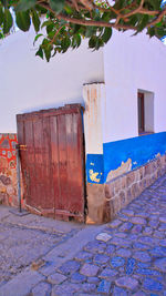 Exterior of old building against blue sky