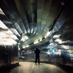 People walking in tunnel