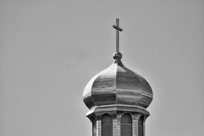 Low angle view of bell tower against sky