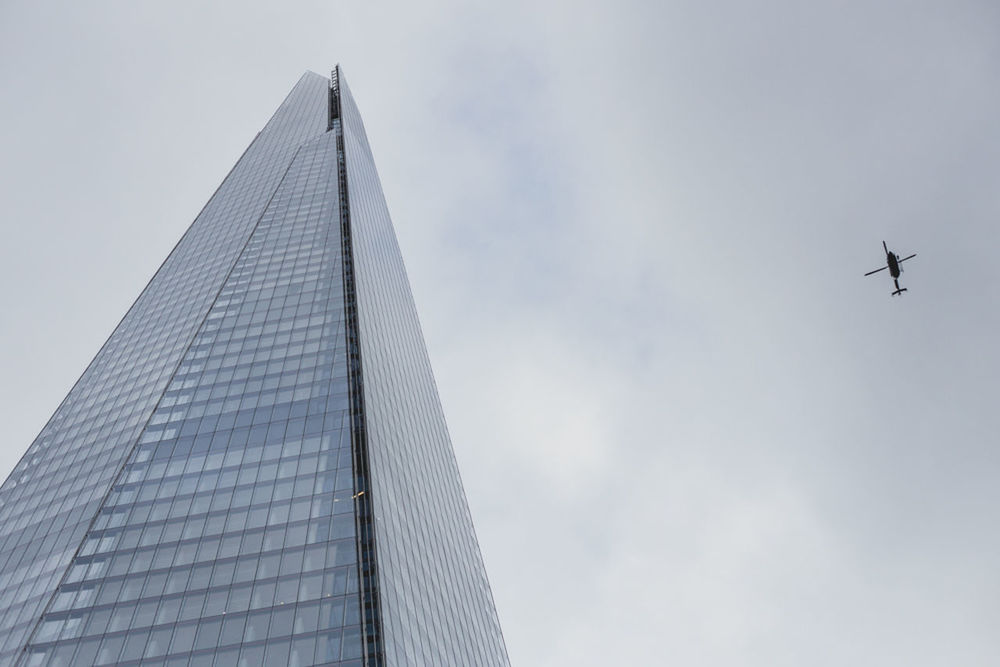 LOW ANGLE VIEW OF TALL BUILDING AGAINST SKY