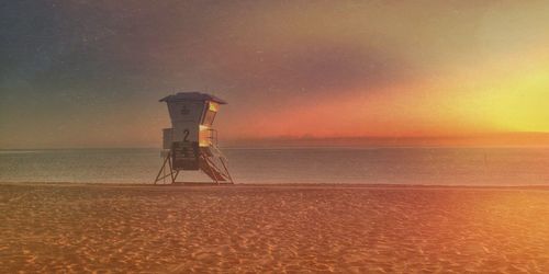 Scenic view of sea at sunset