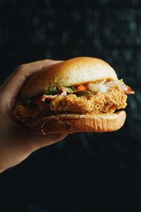 Close-up of hand holding bread