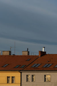 High section of buildings against sky