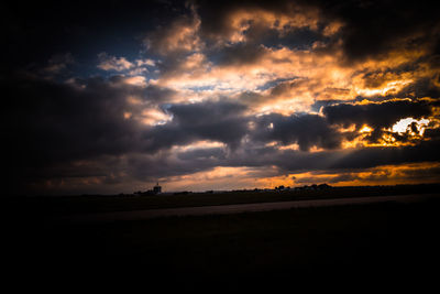 Scenic view of dramatic sky over sea